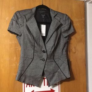 Bebe suit jacket. Matching skirt in other listing.